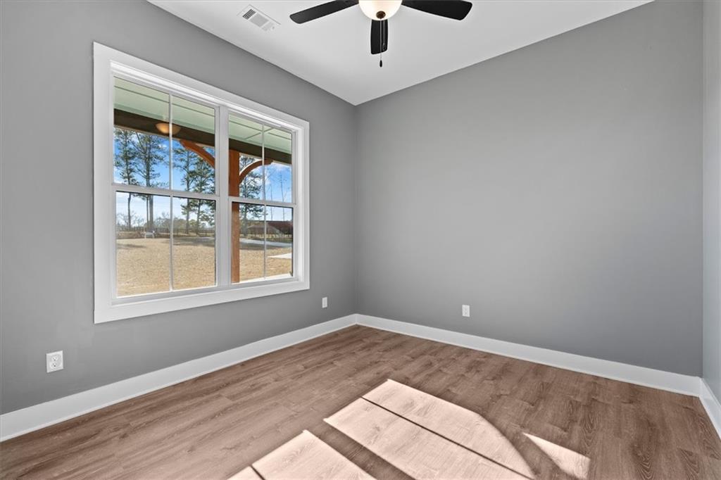 1374 Morgan Road Bremen, GA 30110 - Photo 35 of 50 a view of an empty room with a window