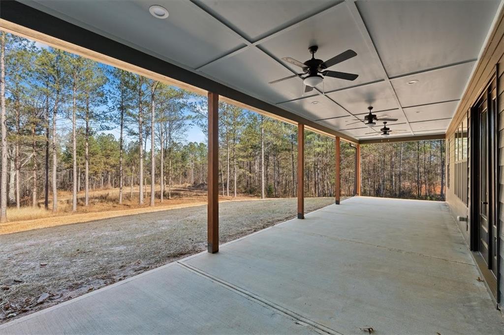 1374 Morgan Road Bremen, GA 30110 - Photo 45 of 50 a view of empty room with wooden floor and iron fence