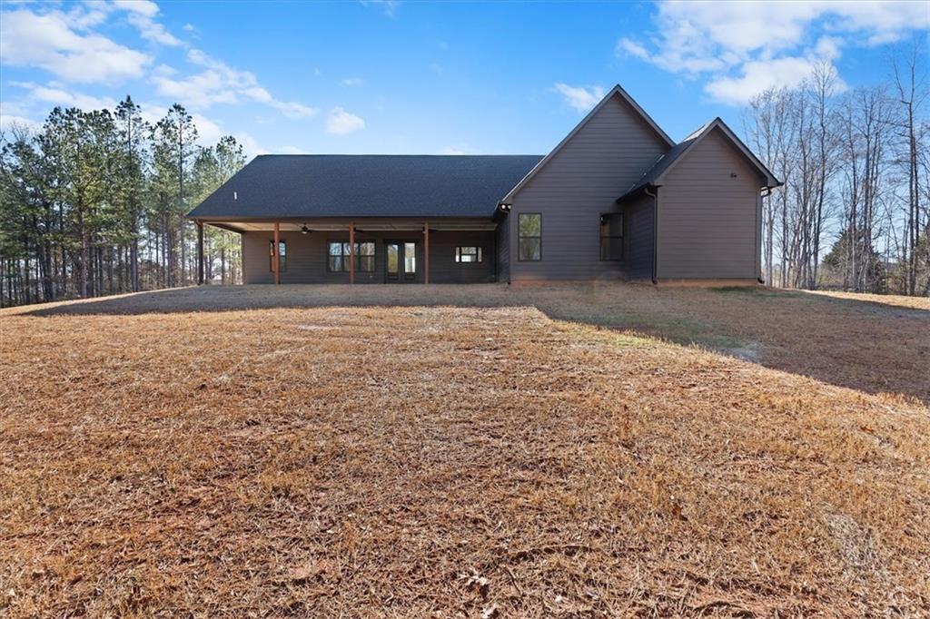 1374 Morgan Road Bremen, GA 30110 - Photo 47 of 50 a front view of house with yard and trees