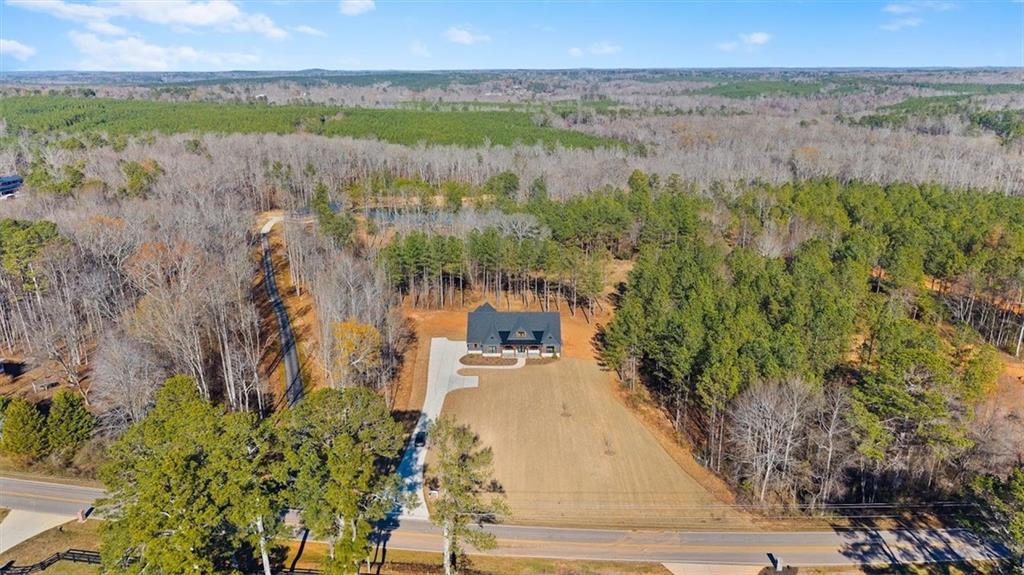 1374 Morgan Road Bremen, GA 30110 - Photo 49 of 50 a view of a lake with a yard