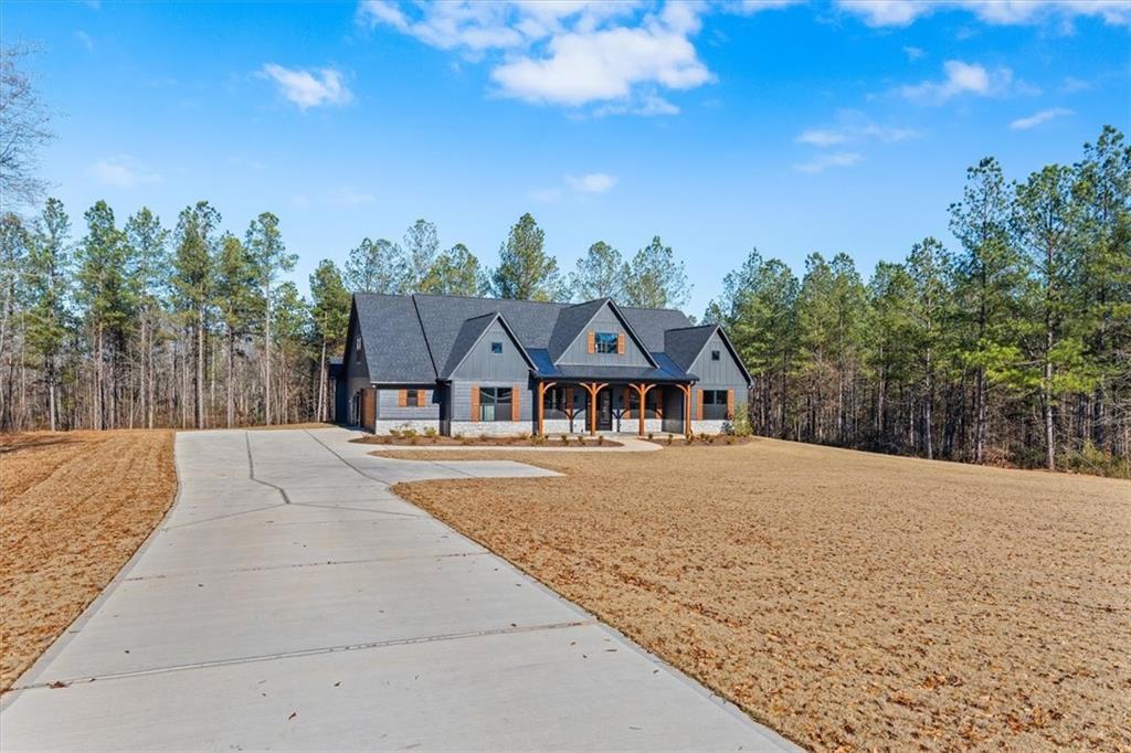 1374 Morgan Road Bremen, GA 30110 - Photo 9 of 50 a front view of a house with a yard