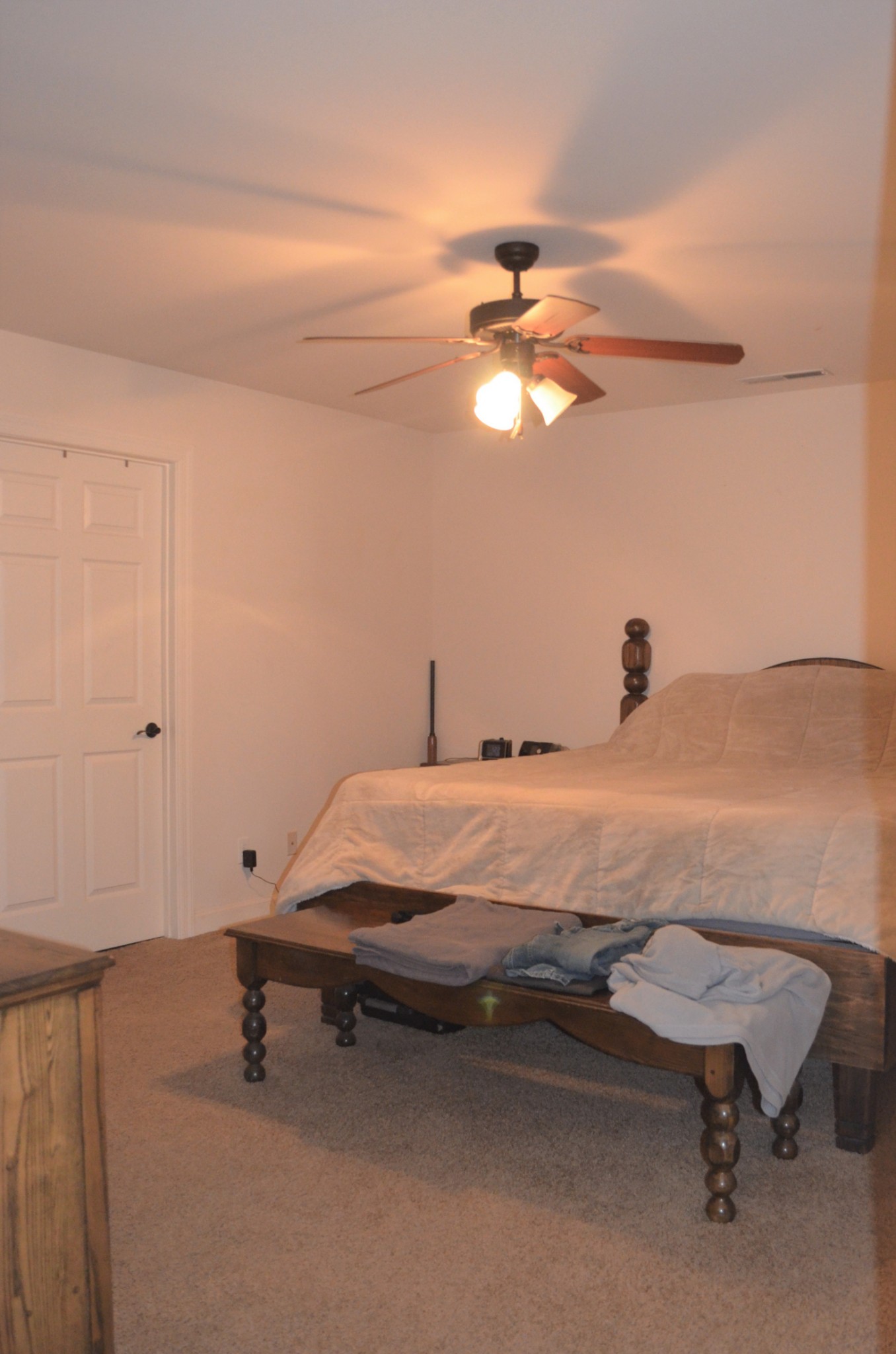 0 Riley Creek Road Normandy, TN 37360 - Photo 6 of 13 a bedroom with a bed and a chandelier
