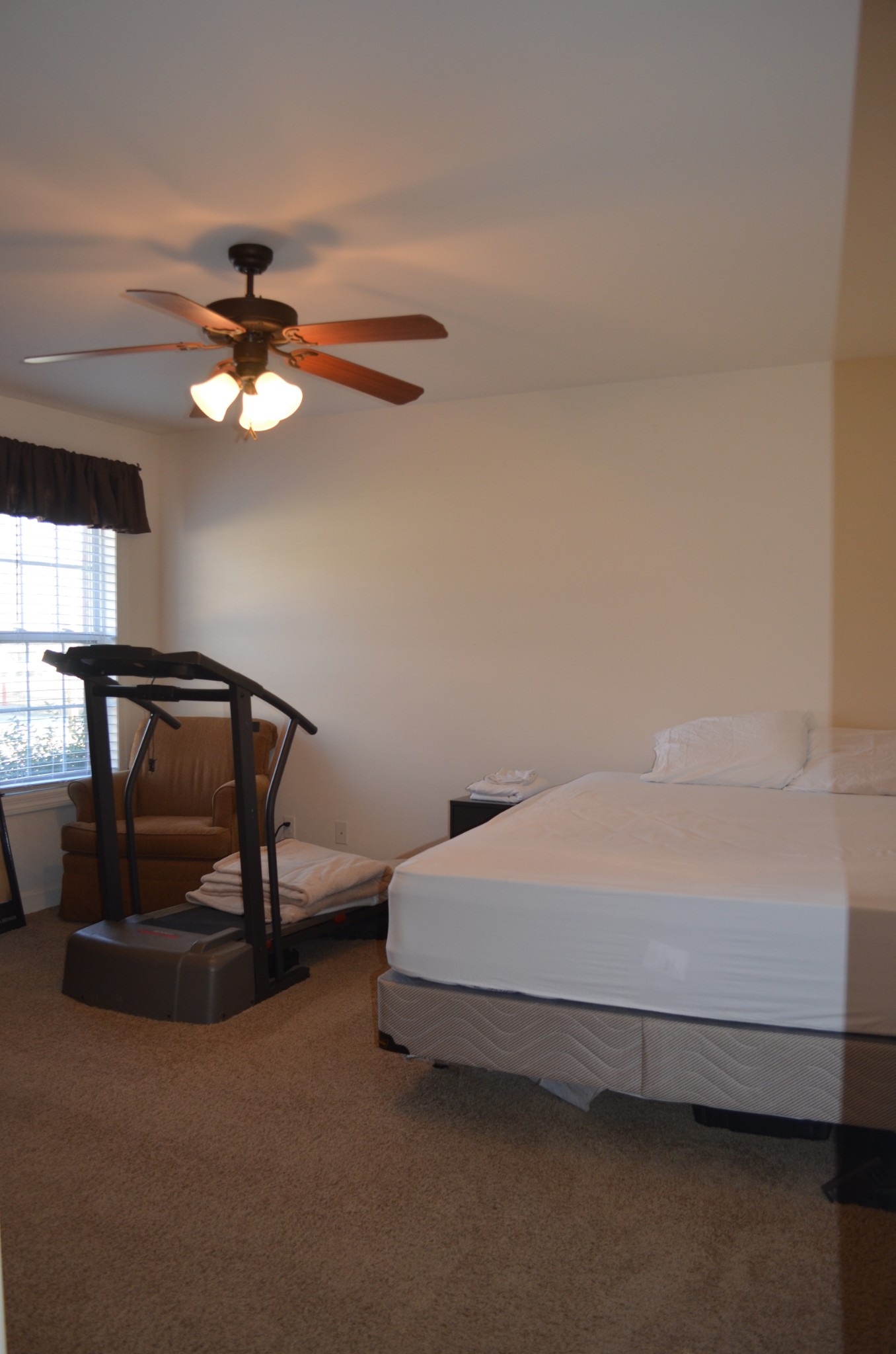 0 Riley Creek Road Normandy, TN 37360 - Photo 7 of 13 a bedroom with a bed and a ceiling fan
