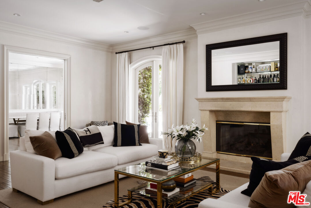 1160 Chantilly Road Los Angeles, CA 90077 - Photo 12 of 32 a living room with furniture fireplace and window