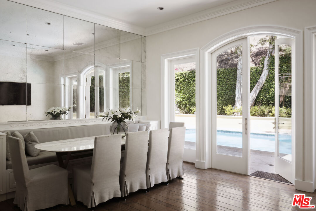 1160 Chantilly Road Los Angeles, CA 90077 - Photo 16 of 32 a large white kitchen with a large window