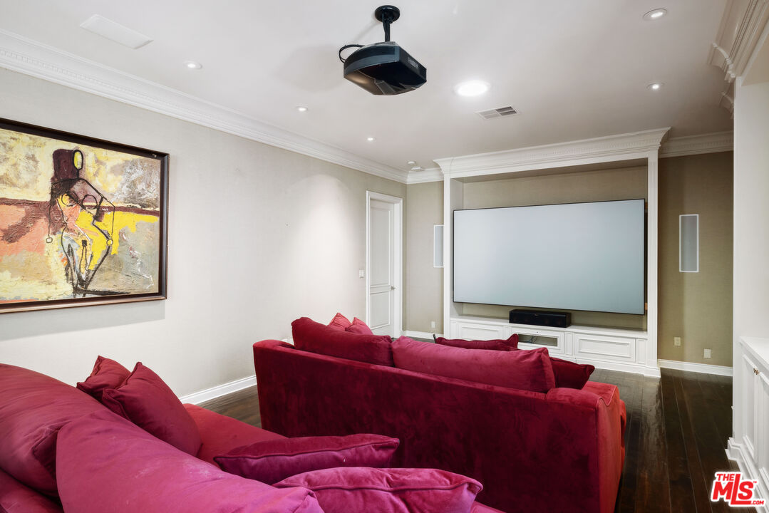 1160 Chantilly Road Los Angeles, CA 90077 - Photo 27 of 32 a living room with furniture and a ceiling fan