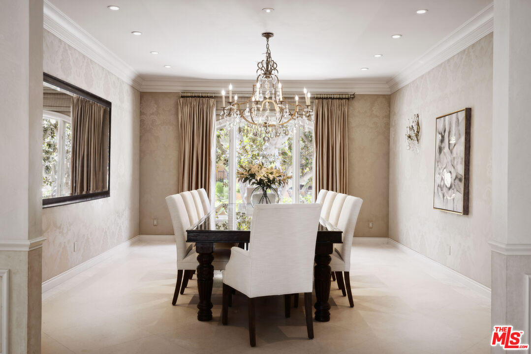 1160 Chantilly Road Los Angeles, CA 90077 - Photo 9 of 32 a view of a dining room with furniture window and wooden floor