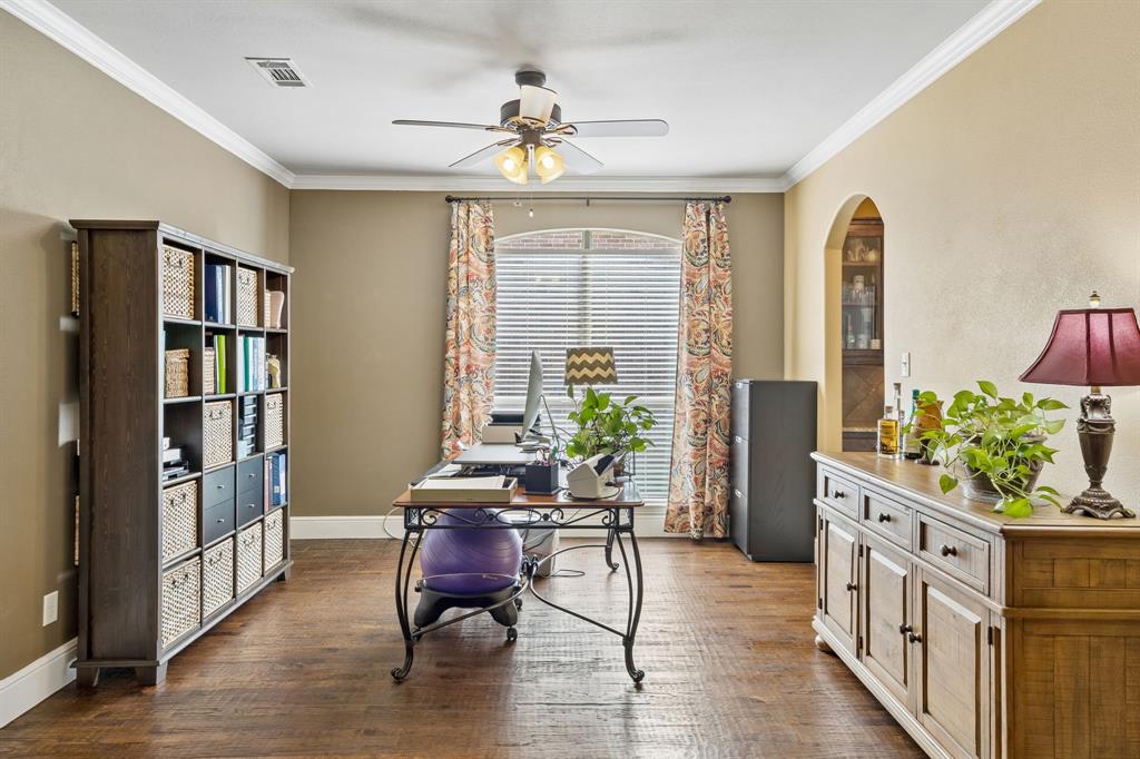 8104 Red Riv Run North Richland Hills, TX 76180 - Photo 6 of 38 a living room with furniture and a bookshelf