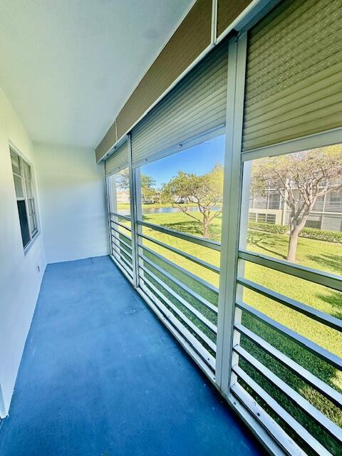 69 Dorset B Boca Raton, FL 33434 - Photo 12 of 25 a view of a room with wooden floor and windows