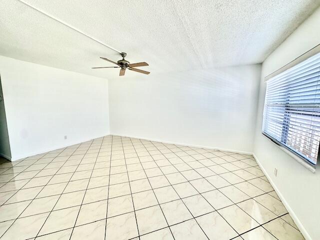 69 Dorset B Boca Raton, FL 33434 - Photo 6 of 25 a view of a room with a ceiling fan and carpet