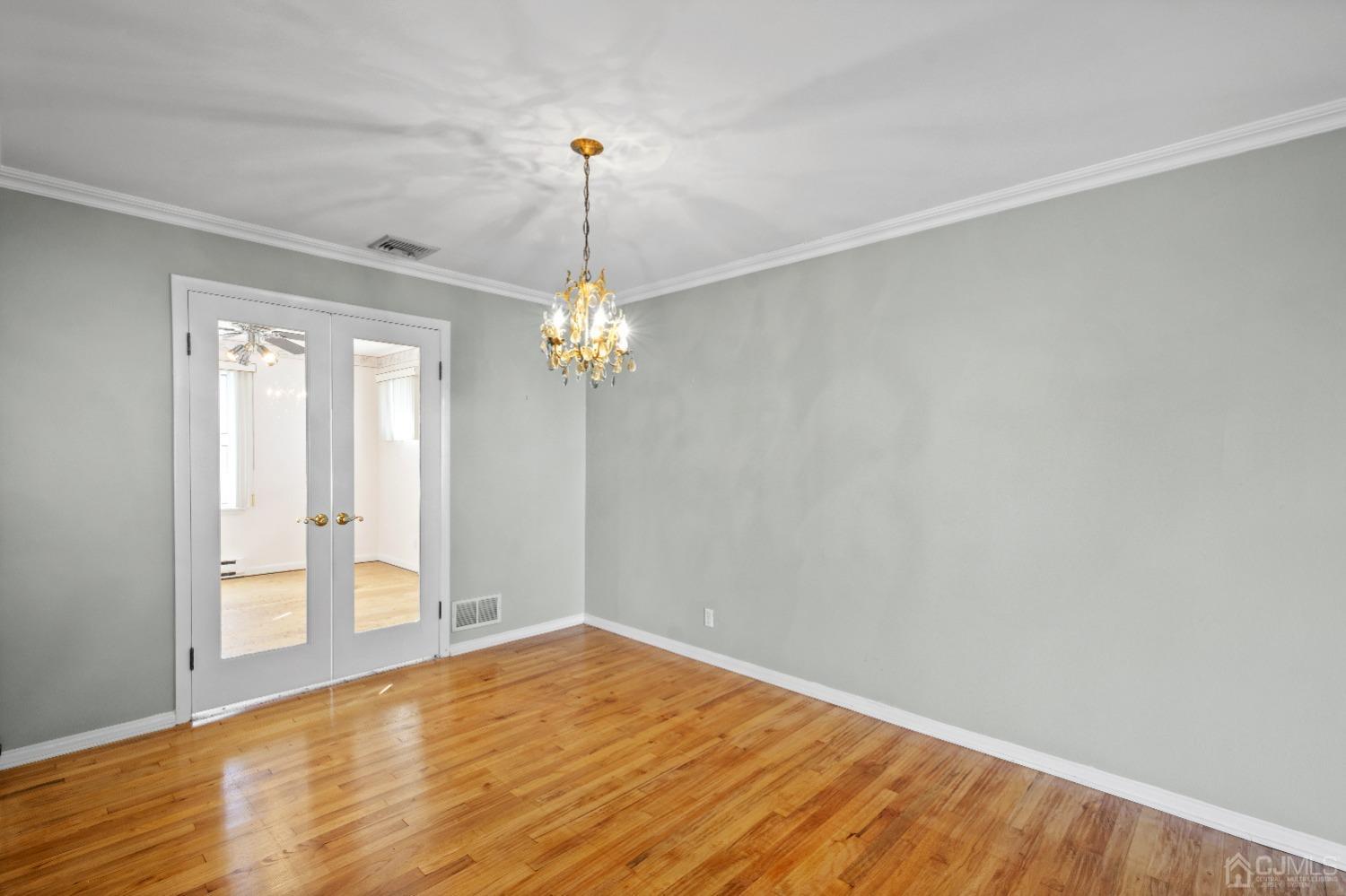 7 Garside Place Clark, NJ 07066 - Photo 14 of 34 a view of empty room with wooden floor and fan
