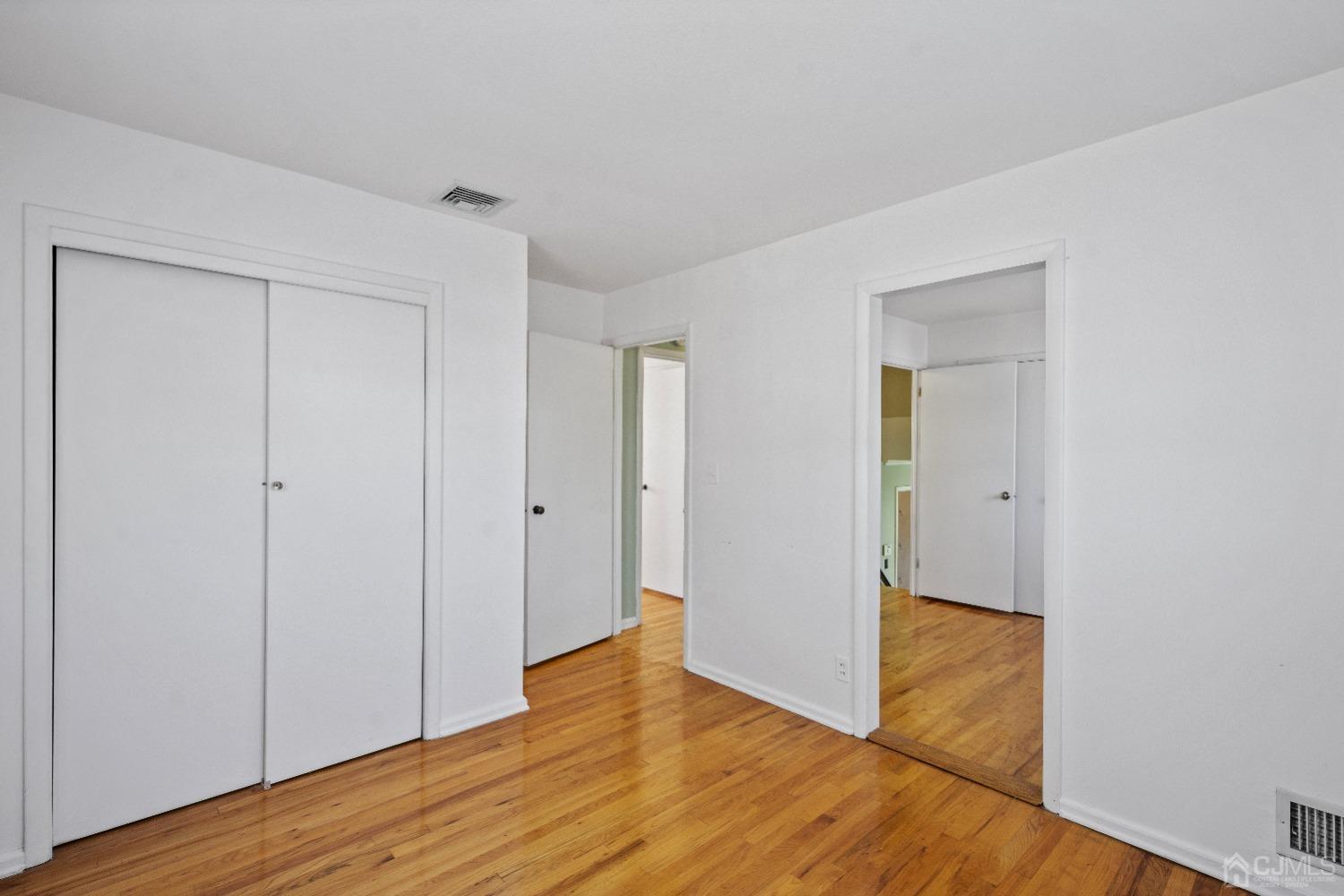 7 Garside Place Clark, NJ 07066 - Photo 26 of 34 a view of wooden floor in an empty room