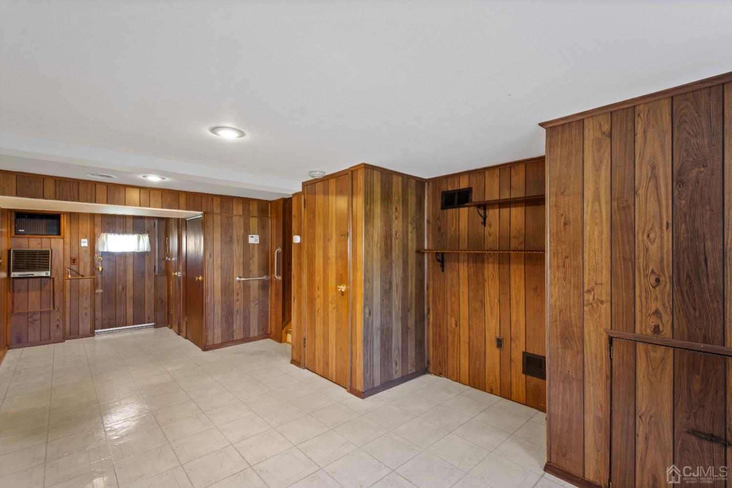 7 Garside Place Clark, NJ 07066 - Photo 30 of 34 a view of a hallway with wooden shelves