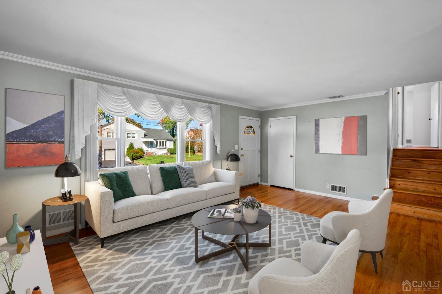 7 Garside Place Clark, NJ 07066 - Photo 8 of 34 a living room with furniture and a large window