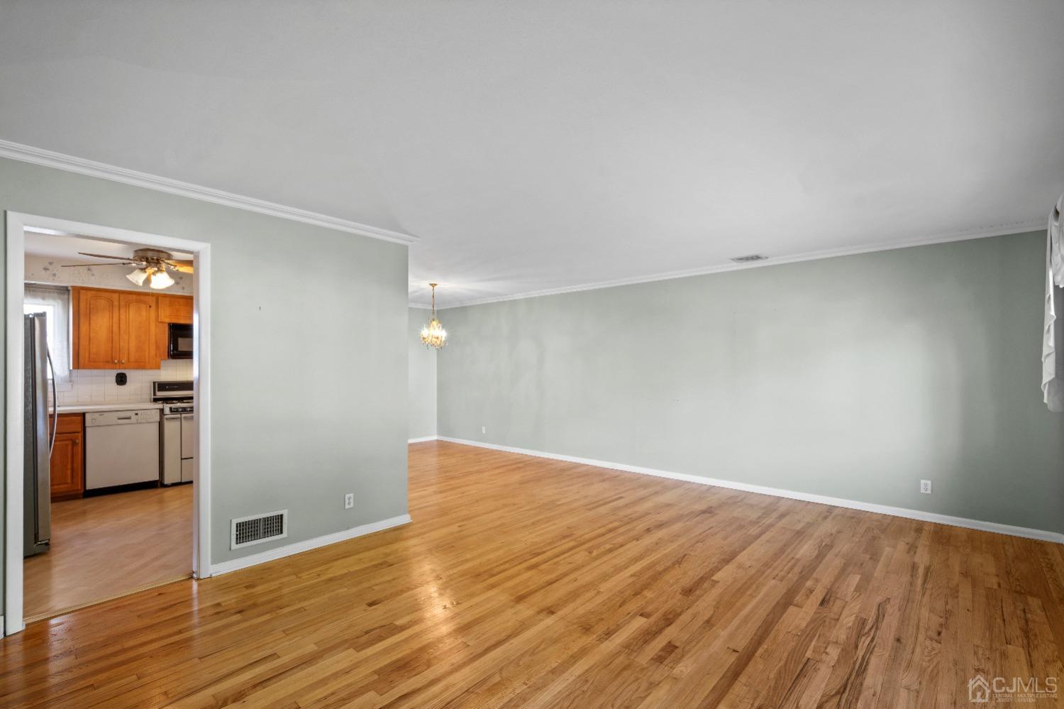 7 Garside Place Clark, NJ 07066 - Photo 9 of 34 a view of empty room with wooden floor
