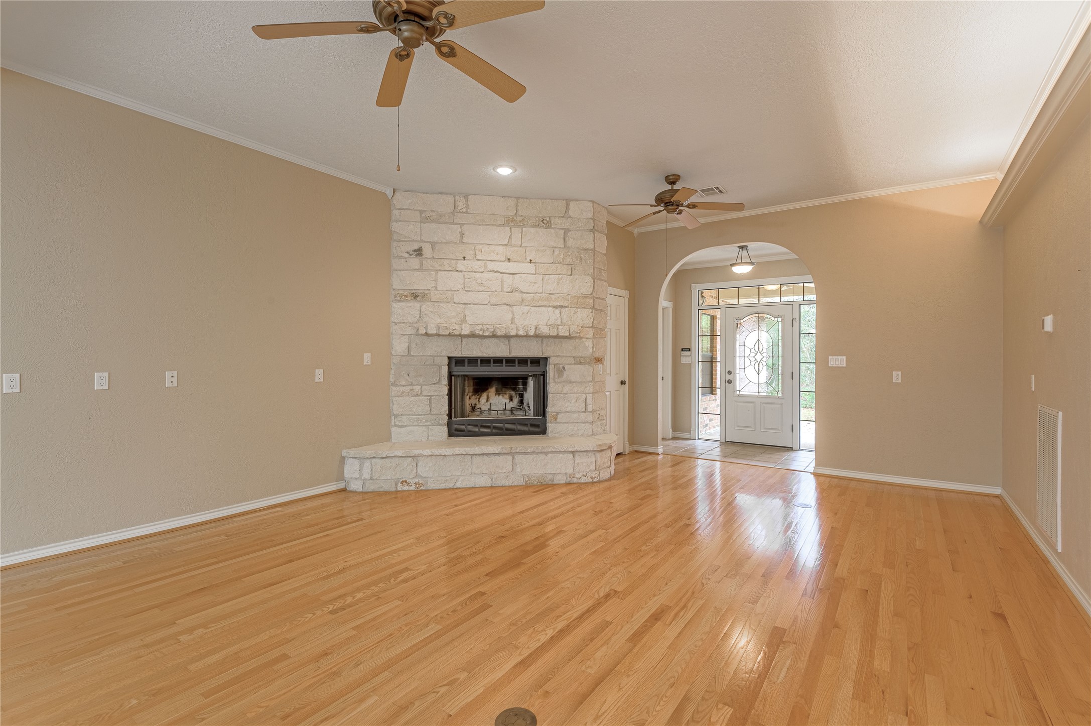20 Tall Timbers Way Huntsville, TX 77320 - Photo 16 of 41 wooden floor in an empty room with a fireplace