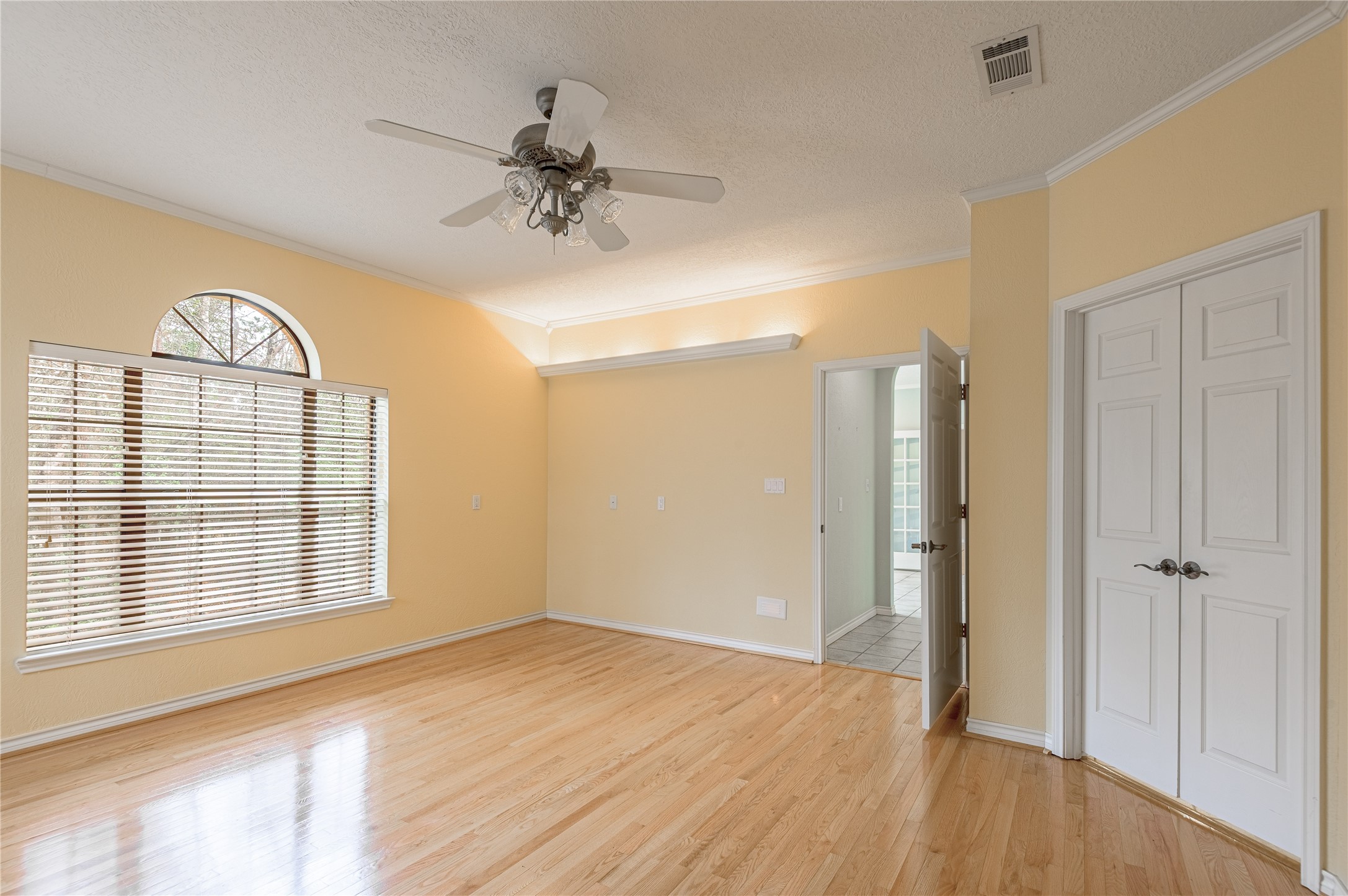 20 Tall Timbers Way Huntsville, TX 77320 - Photo 20 of 41 wooden floor in an empty room with a window