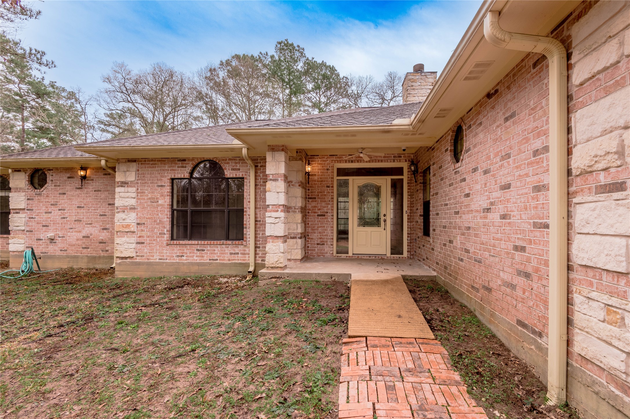 20 Tall Timbers Way Huntsville, TX 77320 - Photo 2 of 41 a view of a pathway with a house