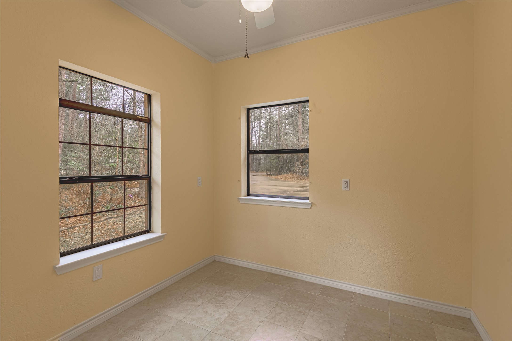 20 Tall Timbers Way Huntsville, TX 77320 - Photo 29 of 41 an empty room with windows and closet