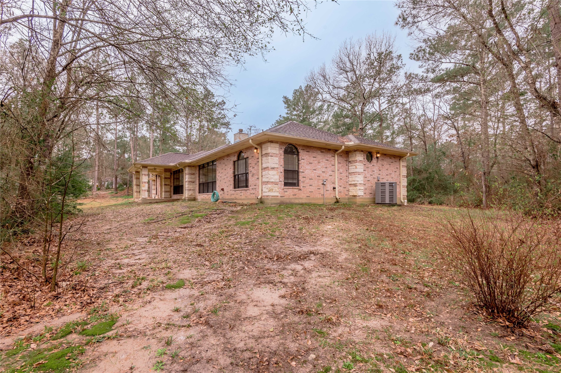 20 Tall Timbers Way Huntsville, TX 77320 - Photo 40 of 41 a front view of house with yard and trees around