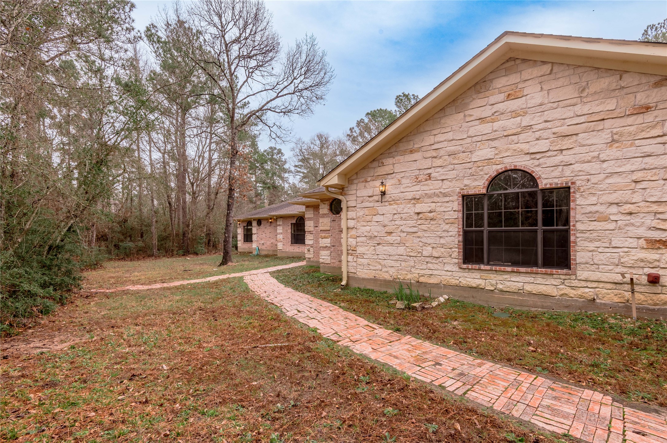 20 Tall Timbers Way Huntsville, TX 77320 - Photo 41 of 41 a front view of a house with a yard and garage