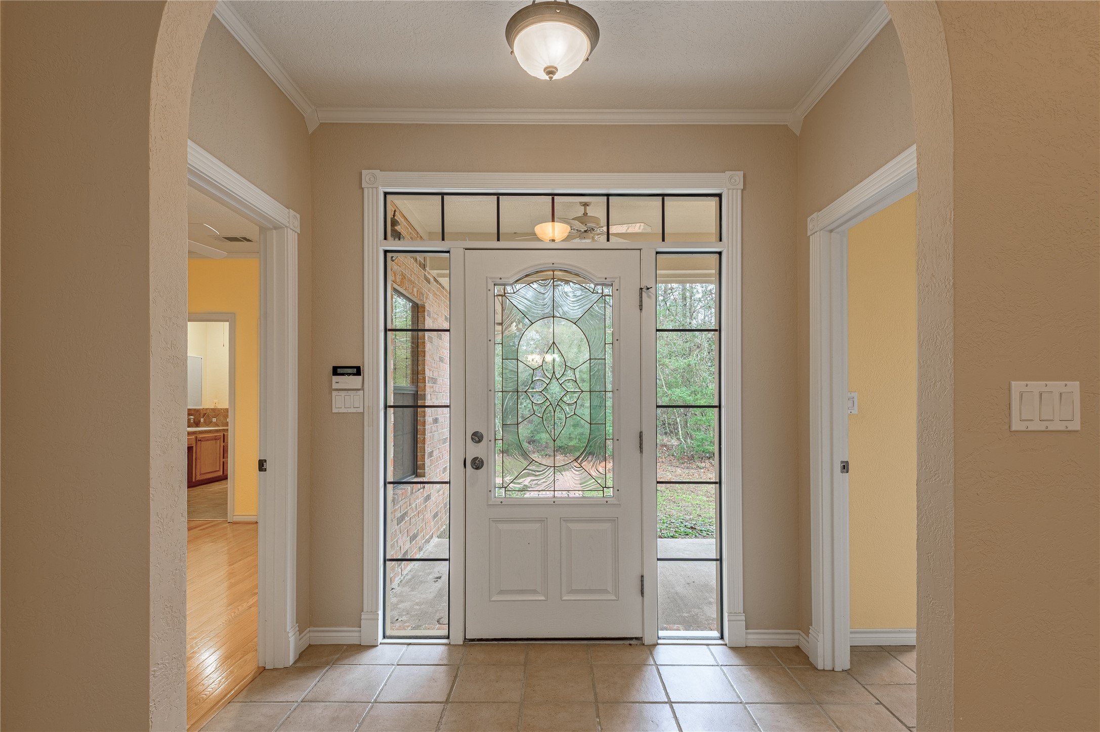 20 Tall Timbers Way Huntsville, TX 77320 - Photo 8 of 41 view of an entryway with wooden floor and a window