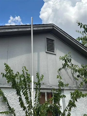 a vase of flowers sitting on a table