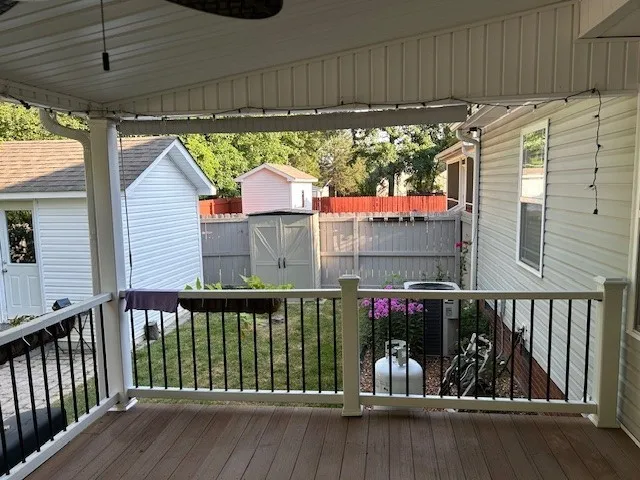 a view of a backyard with sitting area
