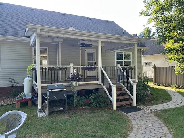 a backyard of a house with seating space