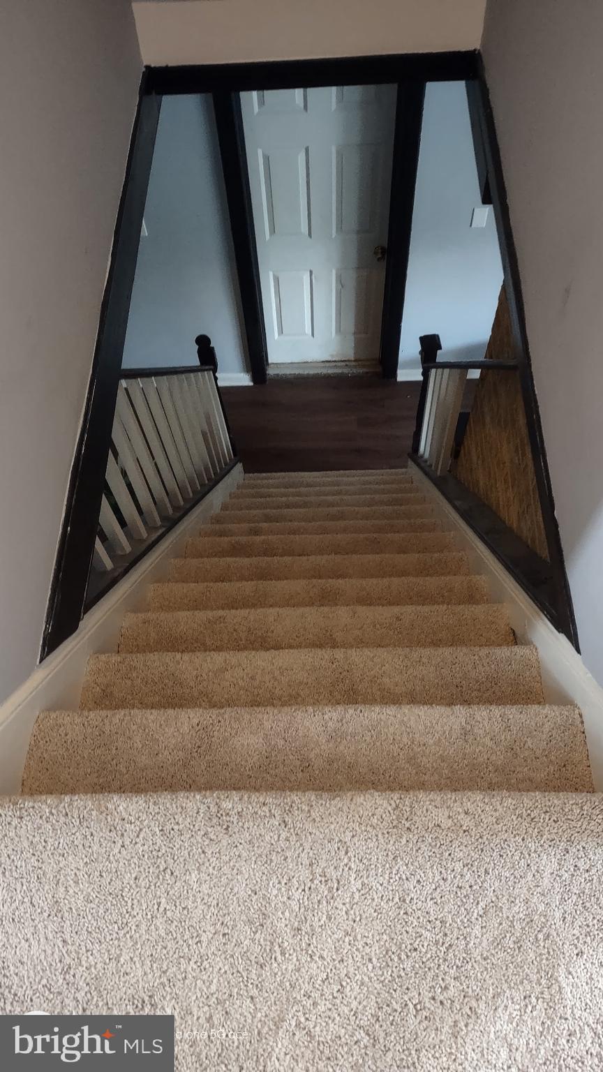 1707 Harman Avenue Baltimore, MD 21230 - Photo 17 of 18 a bedroom with a bed and a window