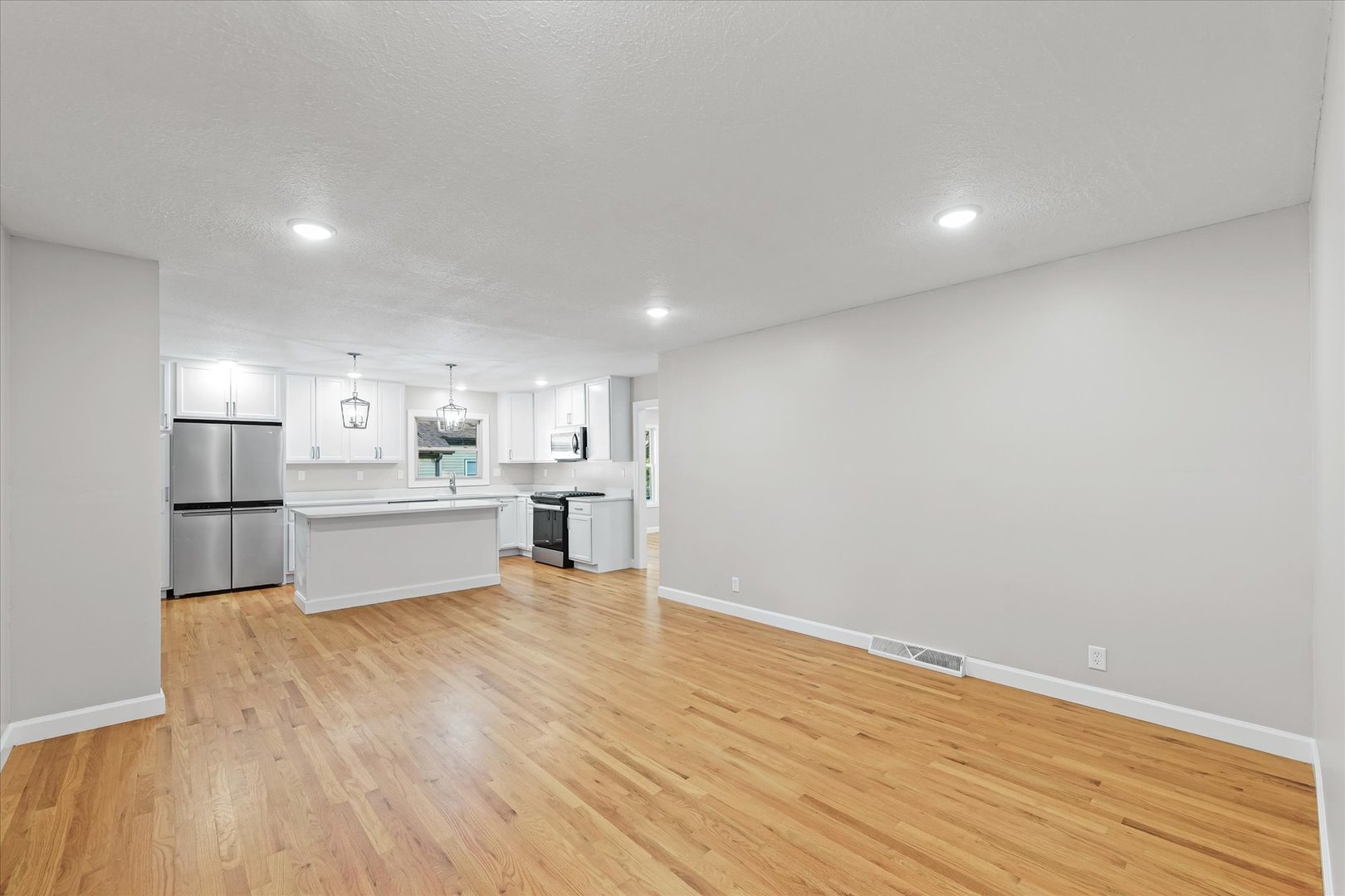 1101 East Pin Oak Drive Mahomet, IL 61853 - Photo 11 of 57 a view of kitchen with wooden floor