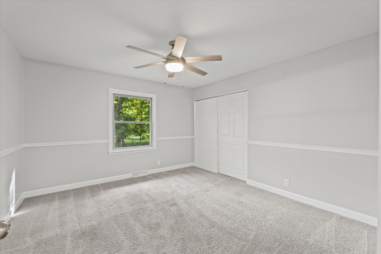 1101 East Pin Oak Drive Mahomet, IL 61853 - Photo 29 of 57 a view of an empty room with a window