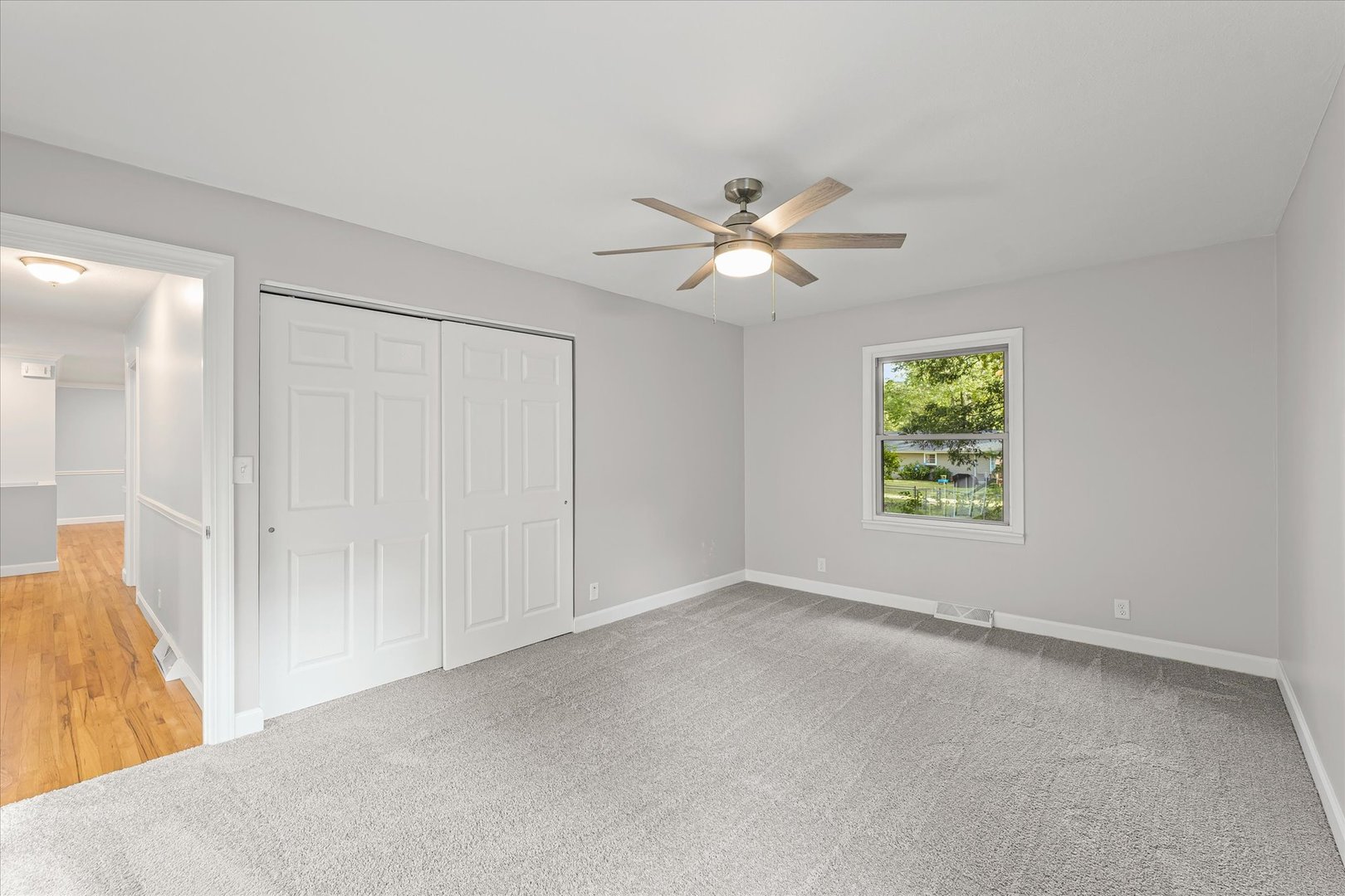 1101 East Pin Oak Drive Mahomet, IL 61853 - Photo 33 of 57 an empty room with a window