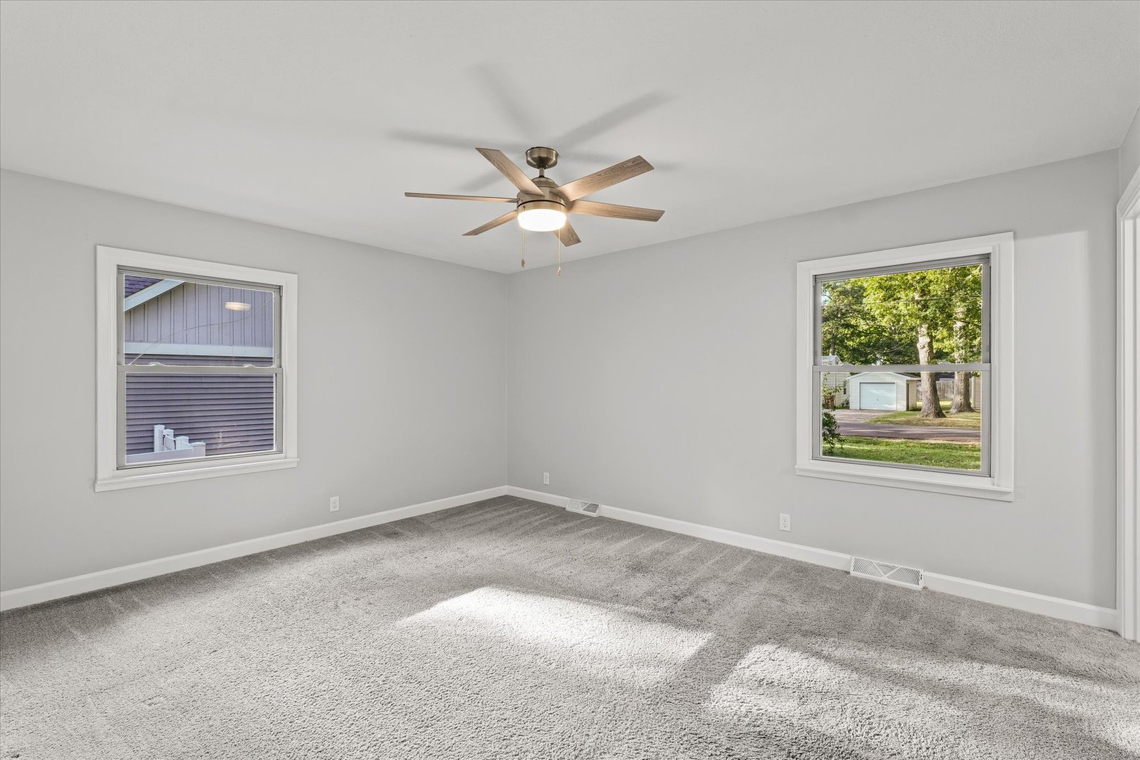 1101 East Pin Oak Drive Mahomet, IL 61853 - Photo 34 of 57 a view of an empty room with a window
