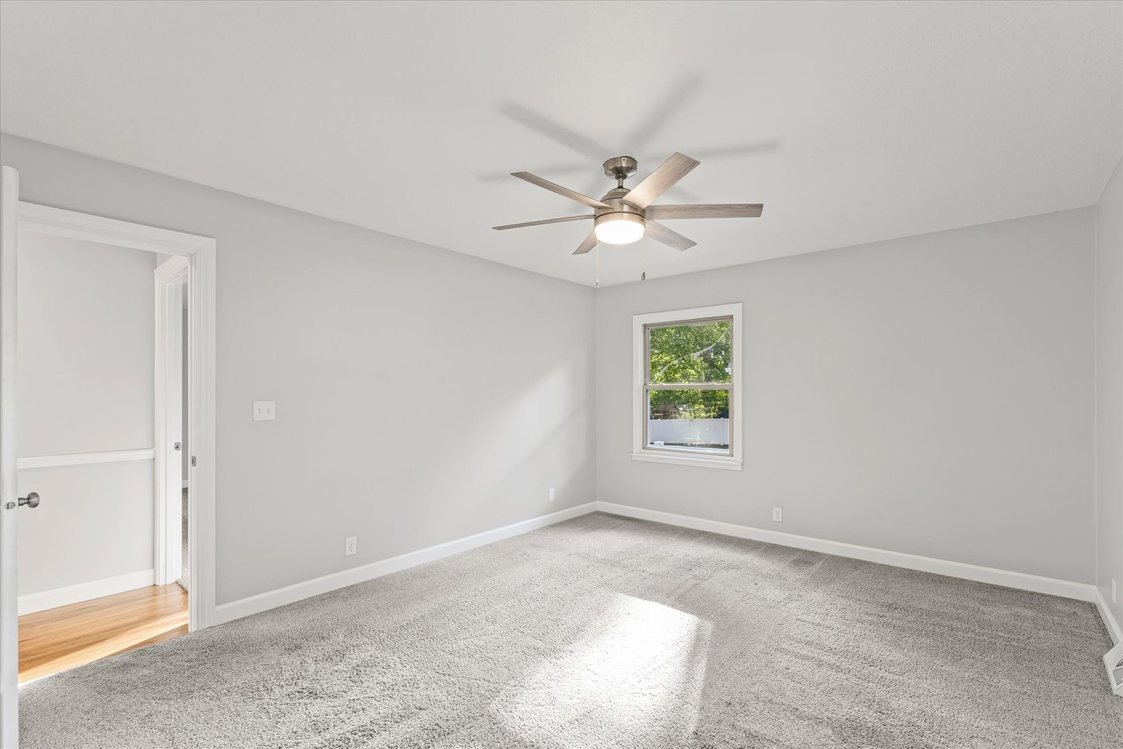 1101 East Pin Oak Drive Mahomet, IL 61853 - Photo 36 of 57 an empty room with a window