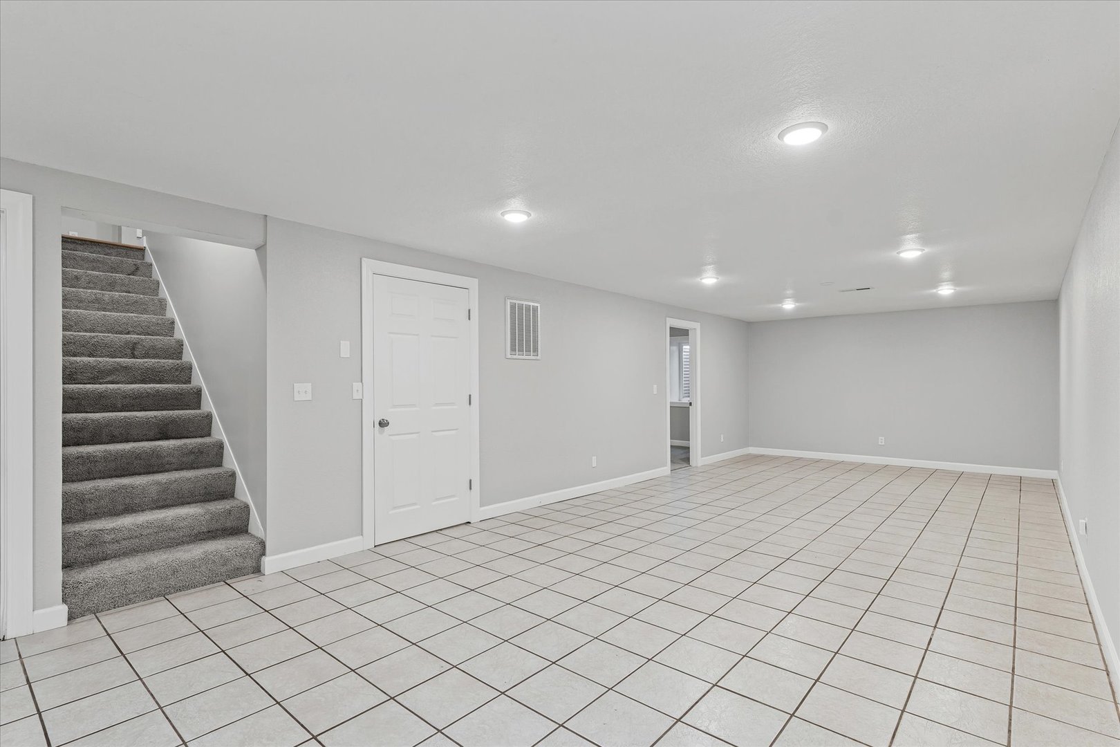 1101 East Pin Oak Drive Mahomet, IL 61853 - Photo 39 of 57 a view of an empty room with stairs