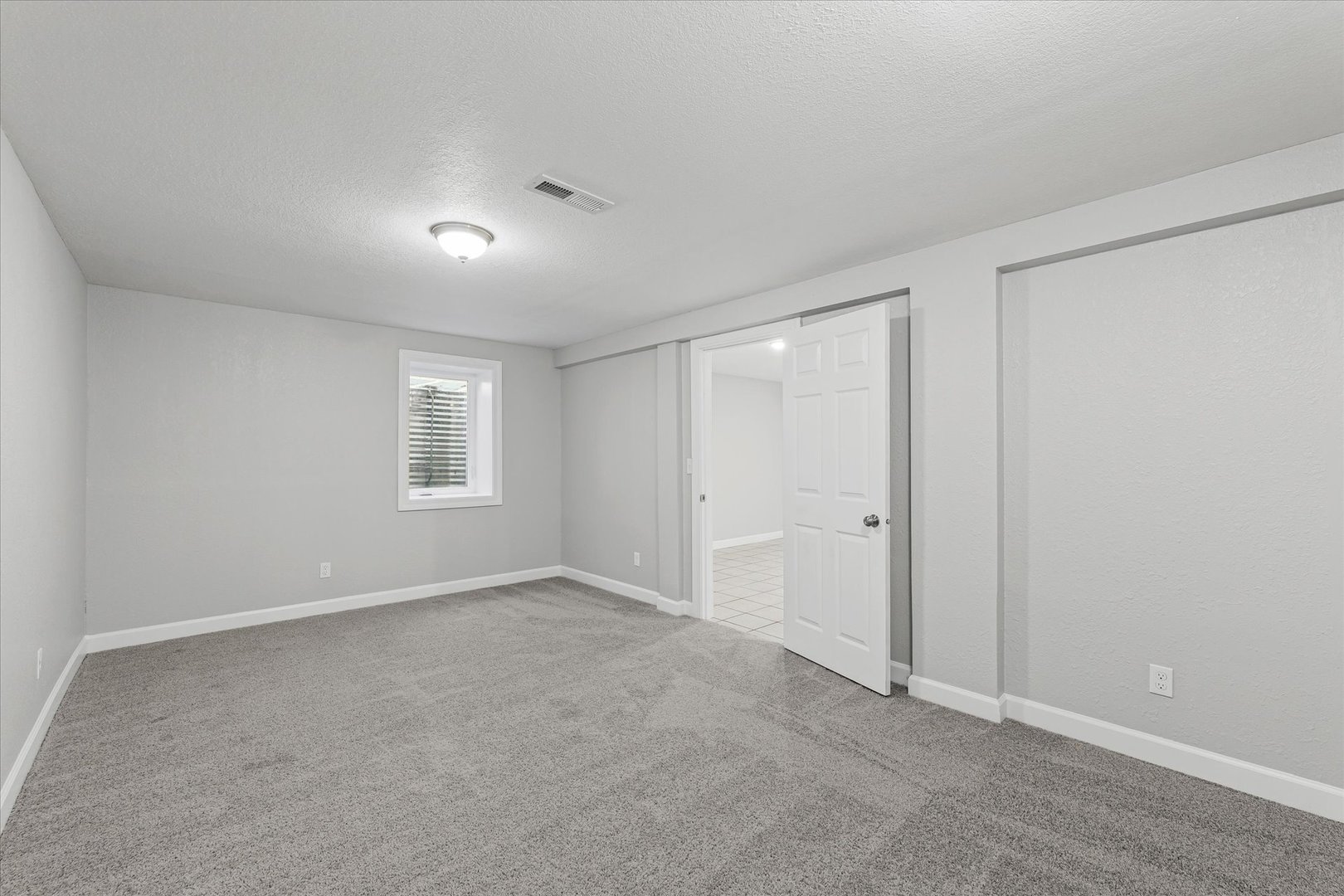 1101 East Pin Oak Drive Mahomet, IL 61853 - Photo 43 of 57 a view of an empty room with a window