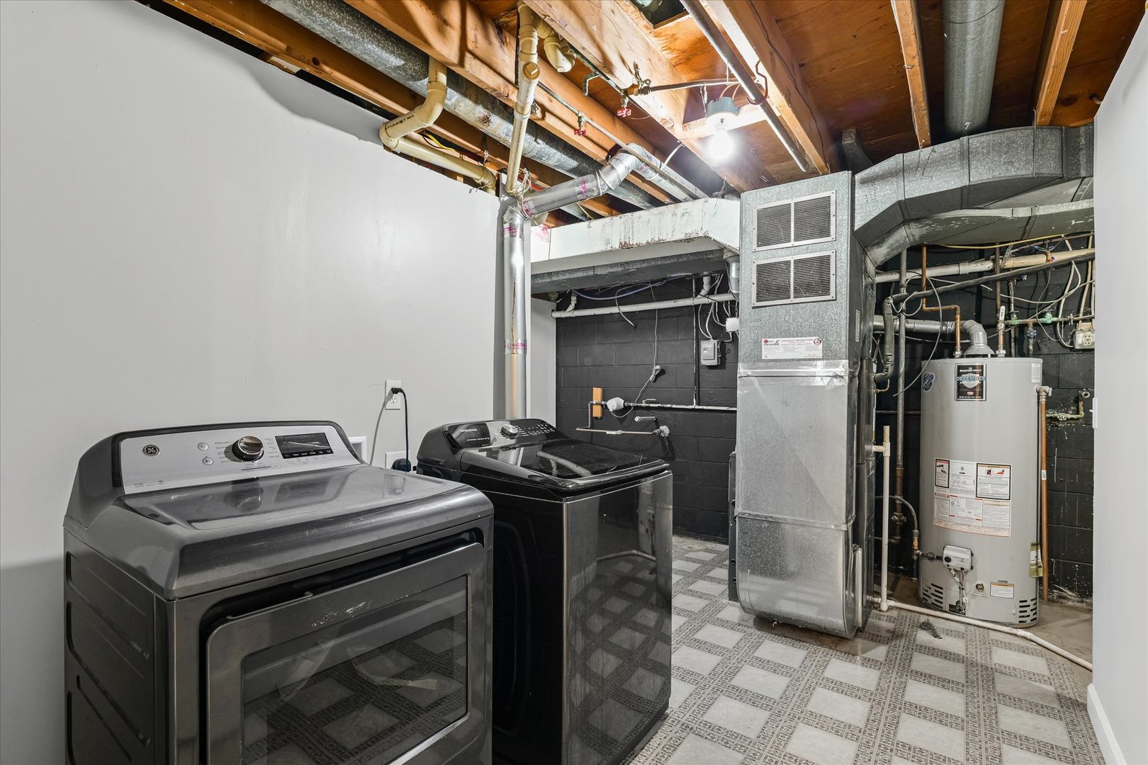 1101 East Pin Oak Drive Mahomet, IL 61853 - Photo 44 of 57 a utility room with dryer and washer