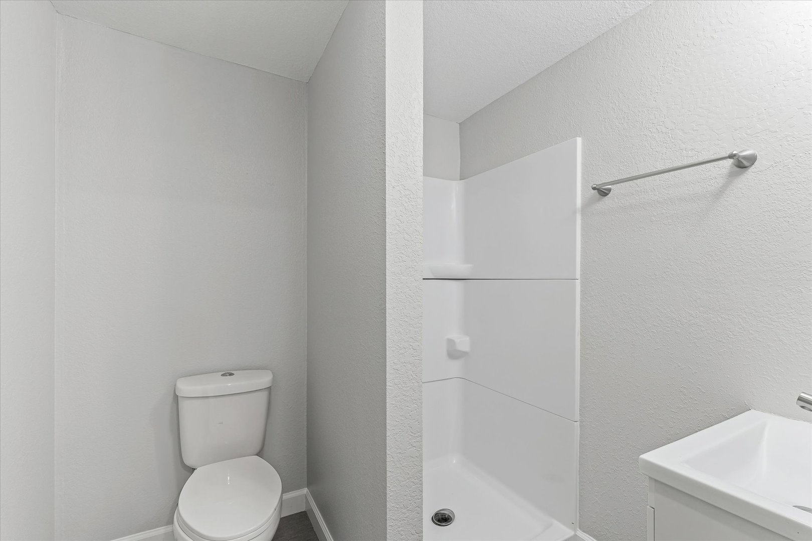 1101 East Pin Oak Drive Mahomet, IL 61853 - Photo 45 of 57 a bathroom with a toilet and a sink