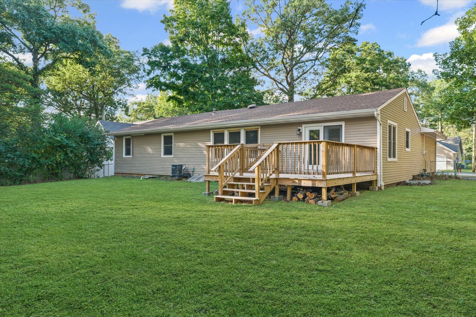 1101 East Pin Oak Drive Mahomet, IL 61853 - Photo 51 of 57 a view of a house with backyard porch and garden
