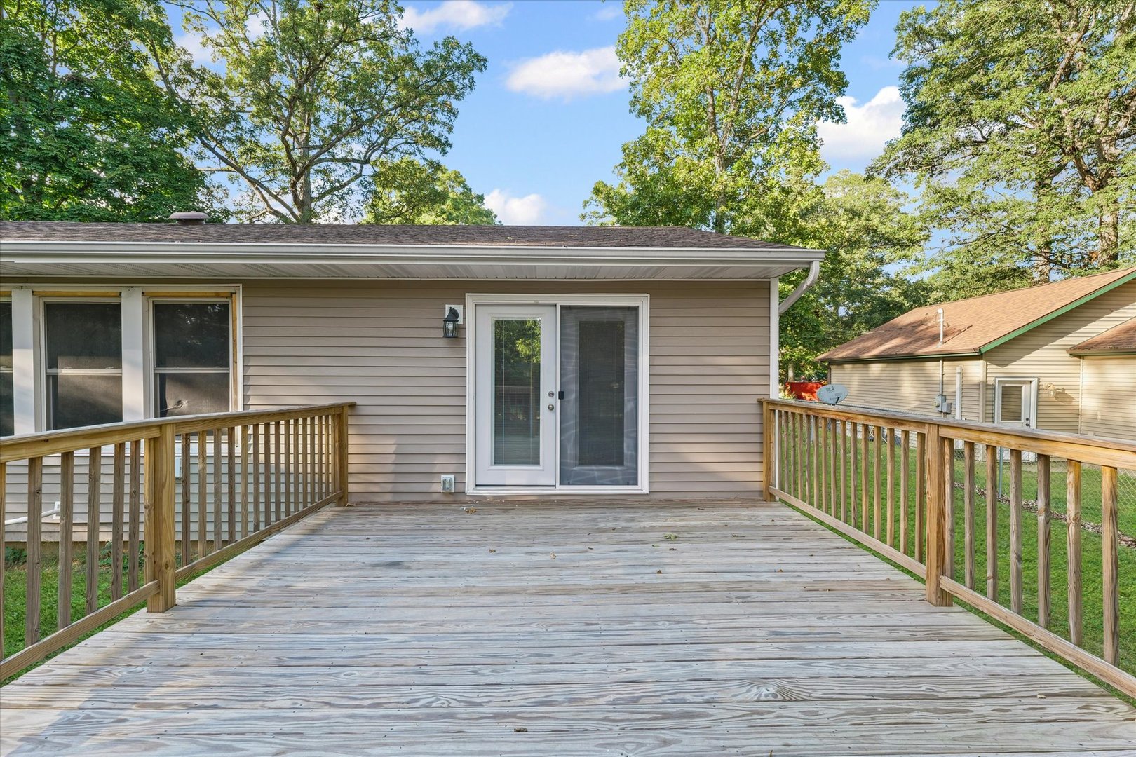 1101 East Pin Oak Drive Mahomet, IL 61853 - Photo 55 of 57 a view of a house with a wooden deck