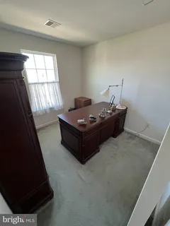 a room with furniture and window