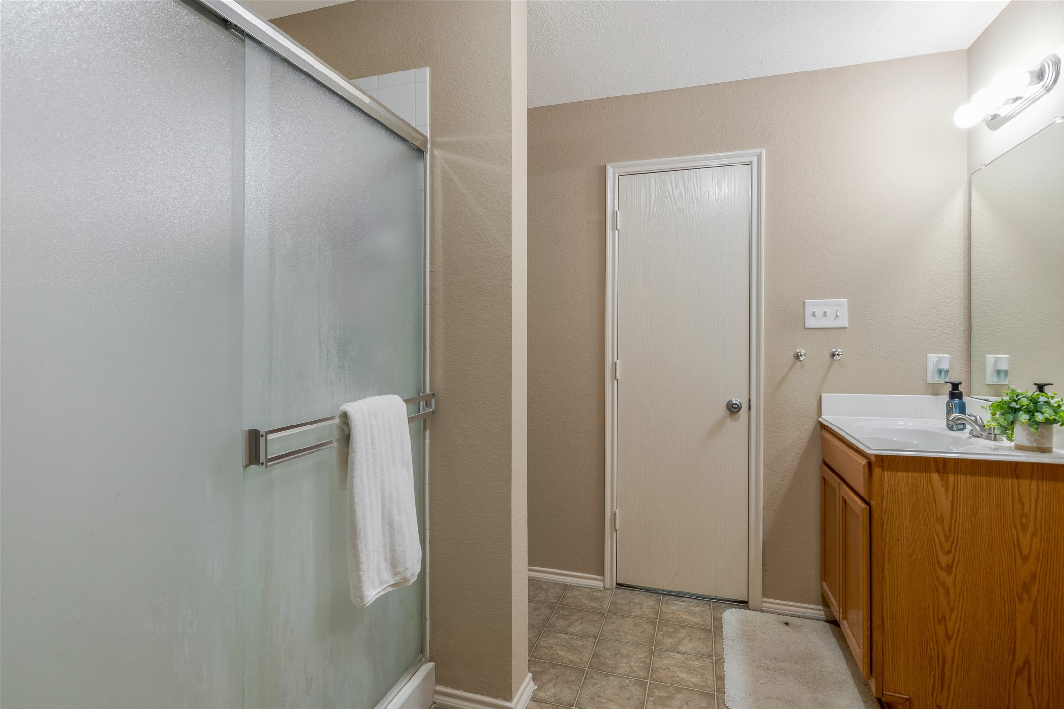 16306 Rustic Stable Lane Cypress, TX 77429 - Photo 20 of 32 Another view of the primary bathroom with the extra large shower!