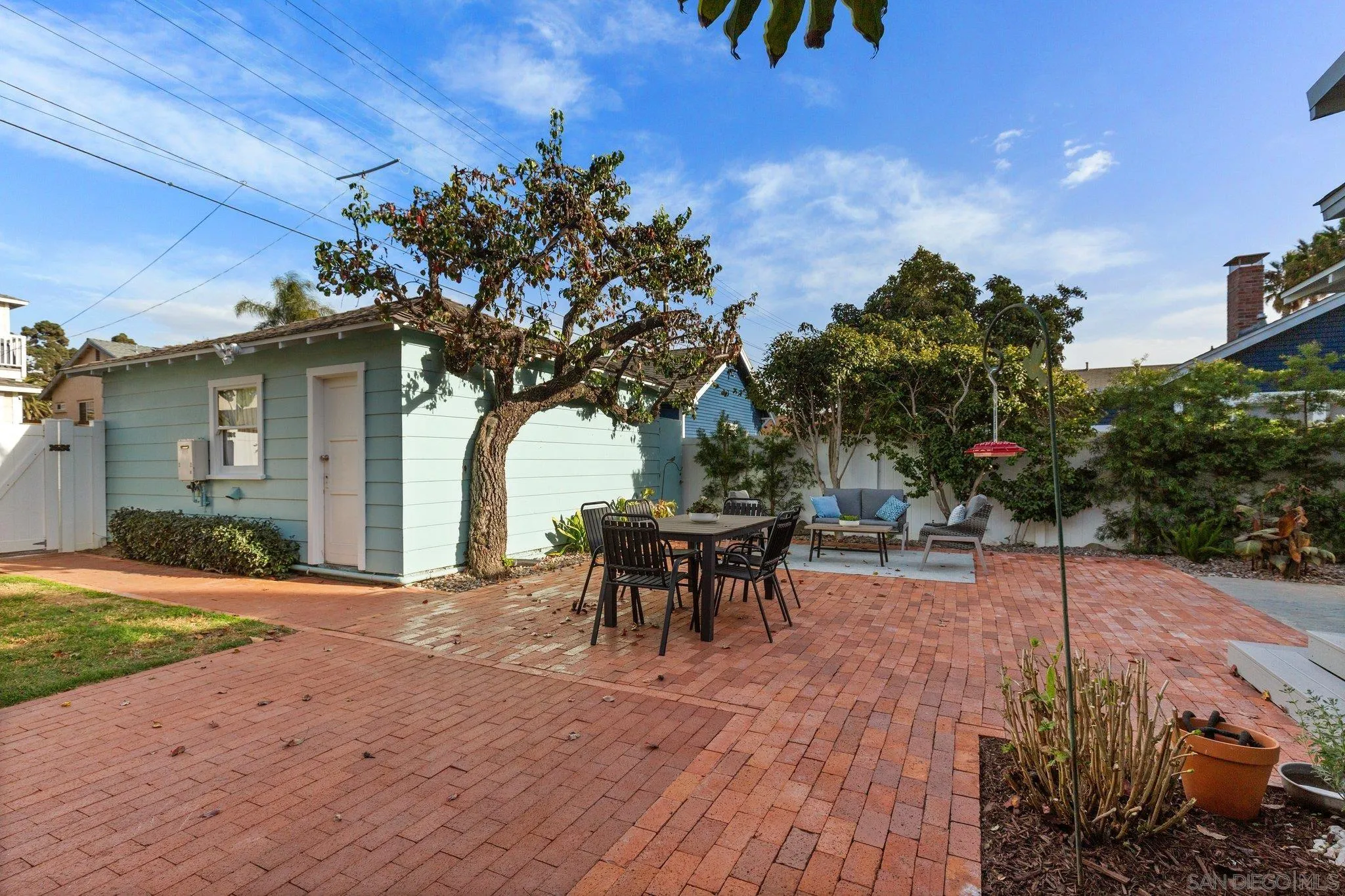 506 South Freeman Street Oceanside, CA 92054 - Photo 11 of 20 a patio with table and chairs and potted plants