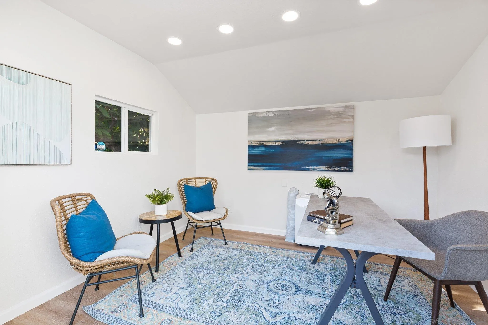 506 South Freeman Street Oceanside, CA 92054 - Photo 16 of 20 a workspace with furniture and wooden floor