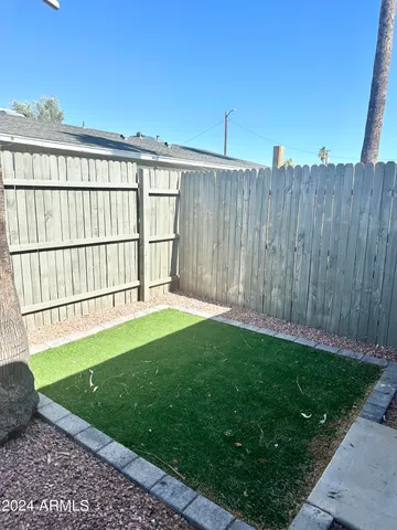 a view of a backyard with a garden