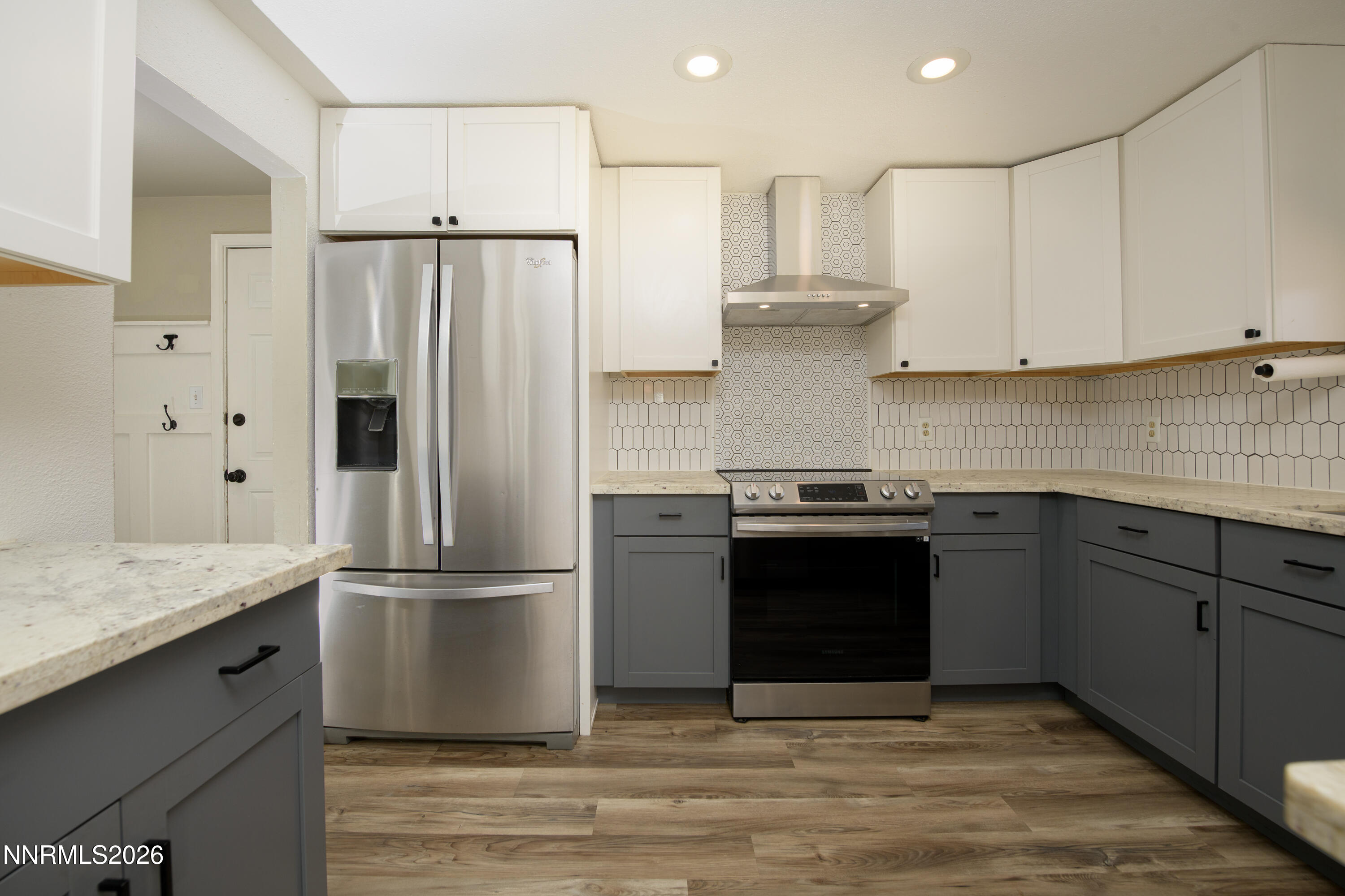 901 Sharrow Way Carson City, NV 89703 - Photo 12 of 45 a kitchen with stainless steel appliances granite countertop a refrigerator and a stove top oven