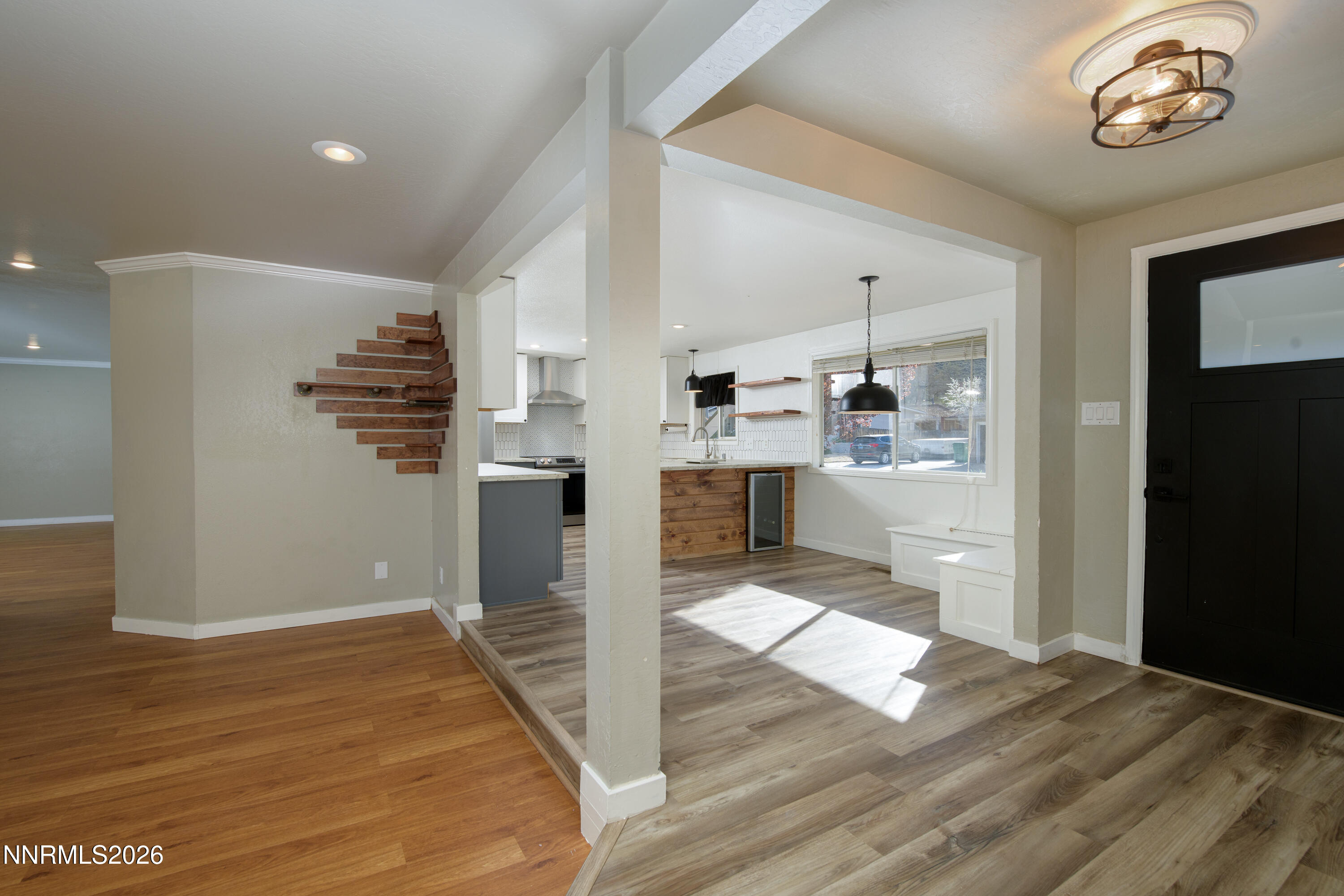 901 Sharrow Way Carson City, NV 89703 - Photo 13 of 45 a view of a kitchen with wooden floor and a refrigerator