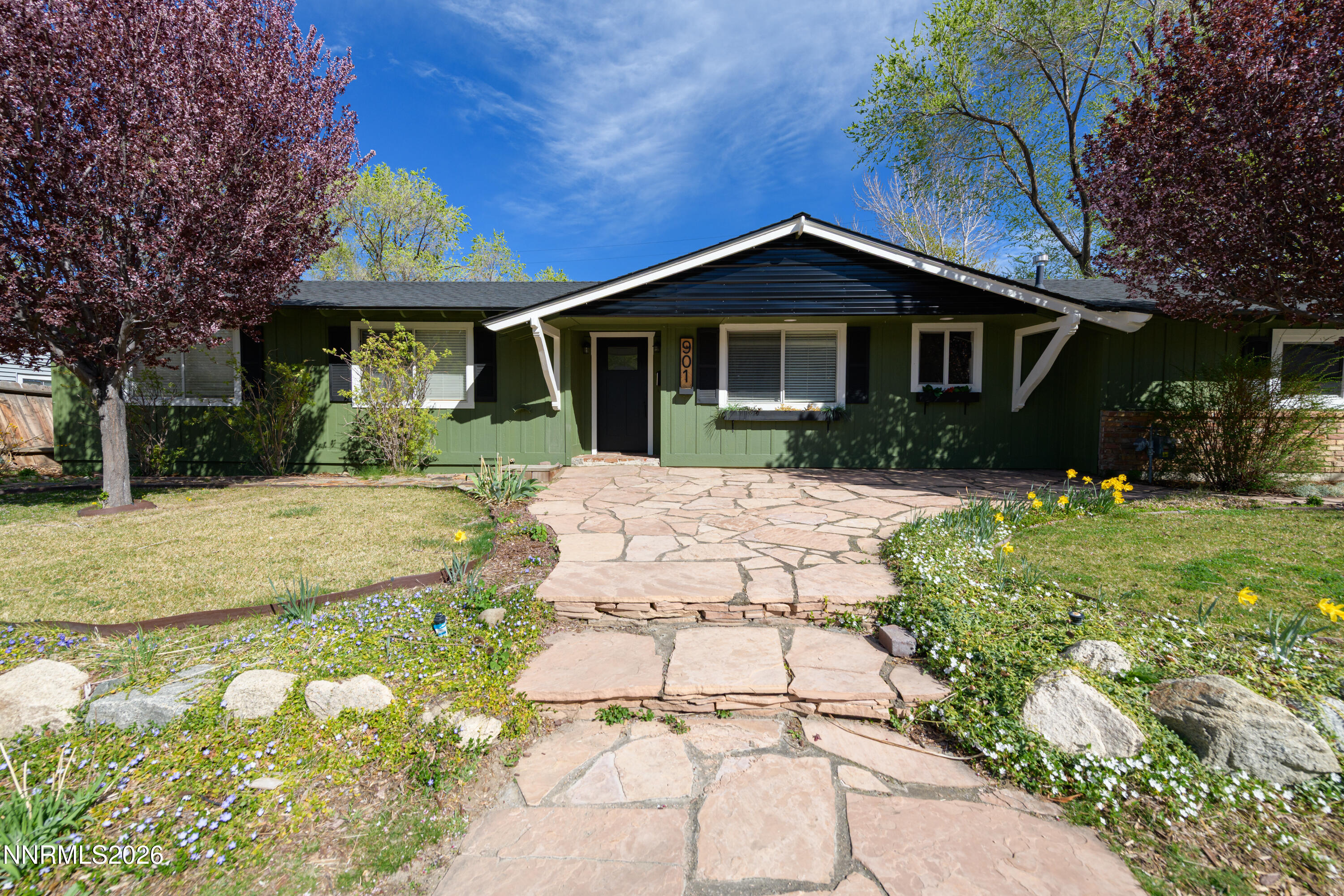 901 Sharrow Way Carson City, NV 89703 - Photo 2 of 45 a front view of a house with a yard