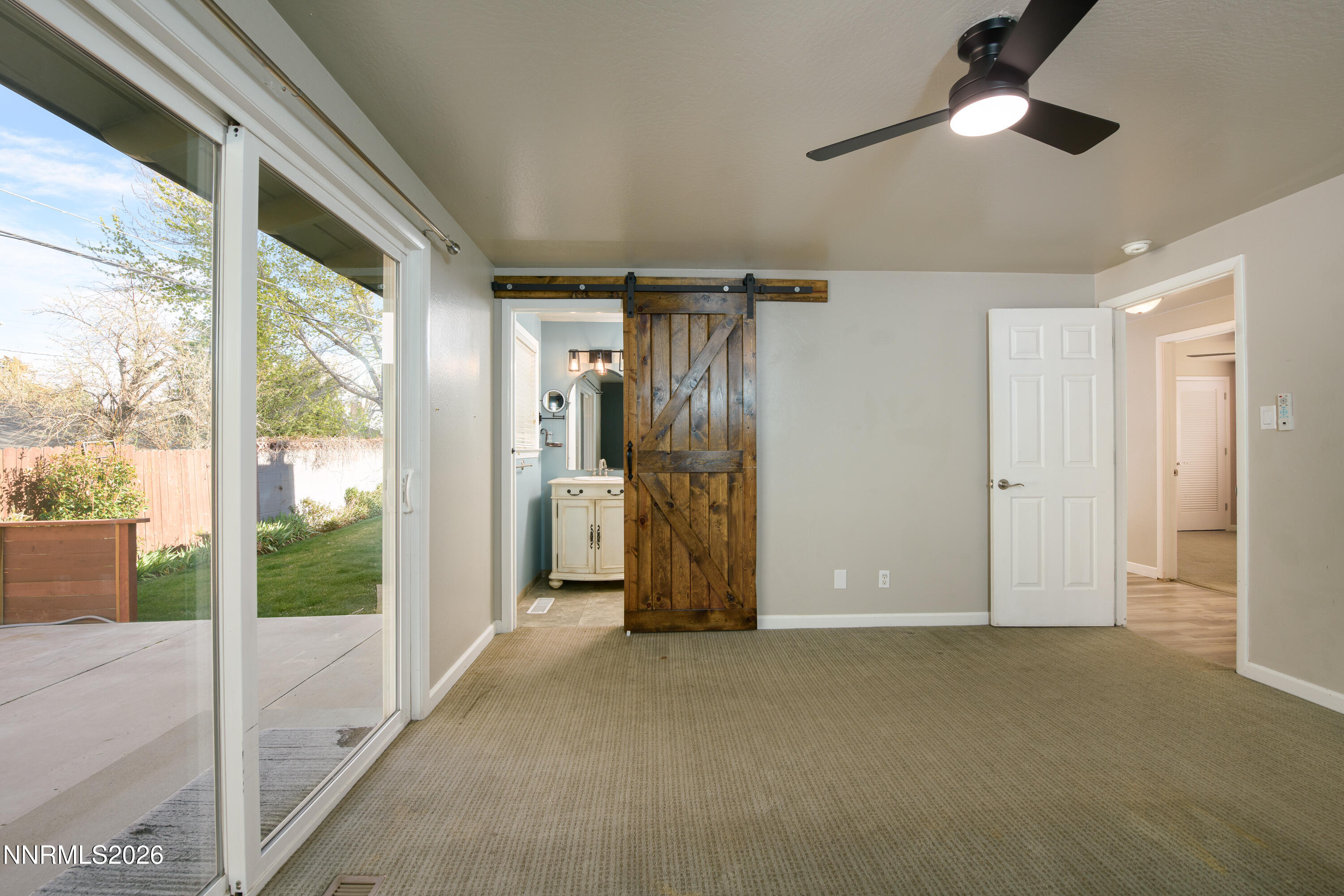 901 Sharrow Way Carson City, NV 89703 - Photo 22 of 45 a view of empty room with wooden floor
